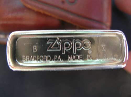 Zippo Lighter, and leather pouch, almost as good as new. See pics , and description for details