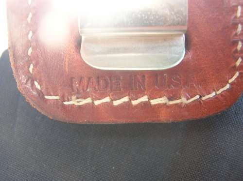 Zippo Lighter, and leather pouch, almost as good as new. See pics , and description for details