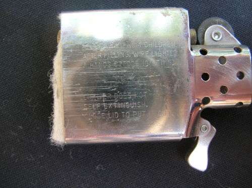 Zippo Lighter, and leather pouch, almost as good as new. See pics , and description for details