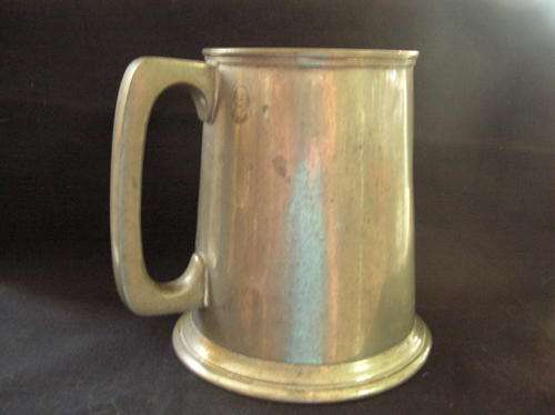 Beer Mug, English Pewter. With etched, or,stamped Shakespeare's head near the handle. condition fair