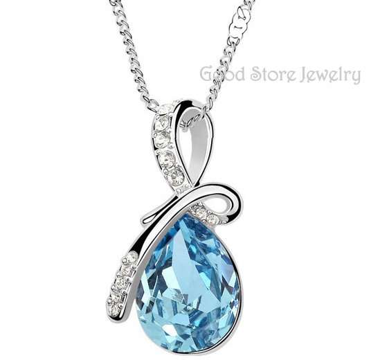 STUNNING BLUE TOPAZ SWAROVSKI NECKLACE IN 18K WHITE GOLD CLAD