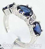 STRIKING SIMULATED SAPPHIRE DIAMOND RING IN 18KGP***SIZE 7