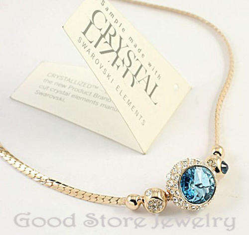 STUNNING BLUE TOPAZ SWAROVSKI NECKLACE IN 18K GOLD CLAD