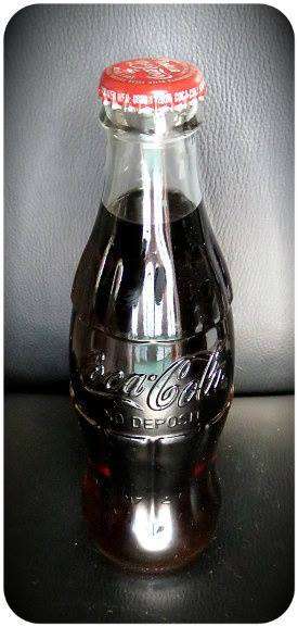 Small Coke bottle with Coke inside