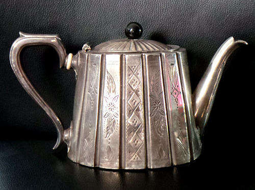 An Old and Elaborate Teapot with Intricate Patterns on the Surface Metal [Some Damage to the lid]