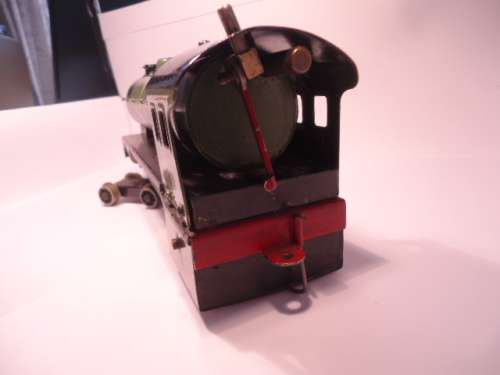 Bassett Lowke - O Guage - 4-4-0 Locomotive + Tender. Loco misson one plate + tender the coals