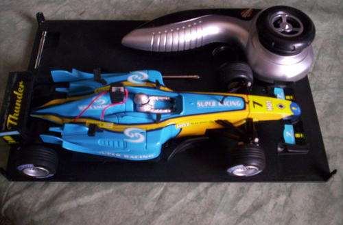 FORMULA 1 RACING CAR IN A CLEAR CARRY CASE