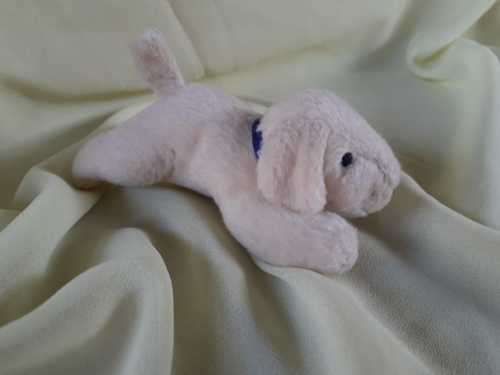 Plush Puppy Lying on Stomach