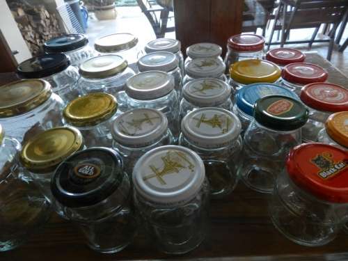 Collection of various empty and cleaned glass jars for canning