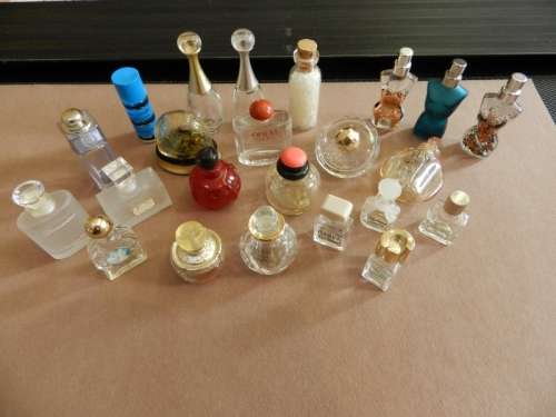 Collection of empty miniature perfume bottles