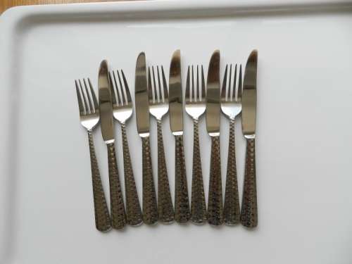 Cutlery Set  10 piece.  Stainless Steel Cutlery Set marked 18/8 heavy handled hammered design
