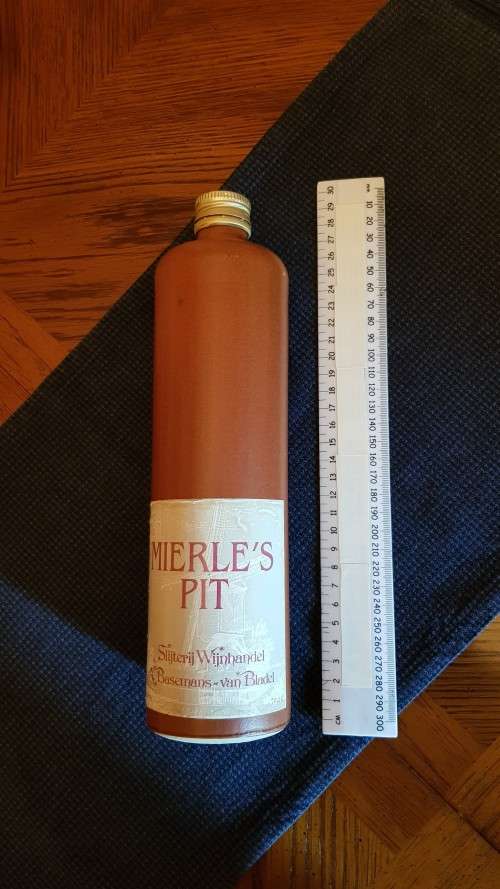 Collectable Stone Bottle (empty) with stopper.  Label  Mierles Pit, tall bottle - colour brown.