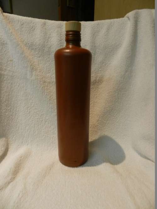 Collectable Stone Bottle (empty) with stopper.  No label, tall bottle - colour brown.