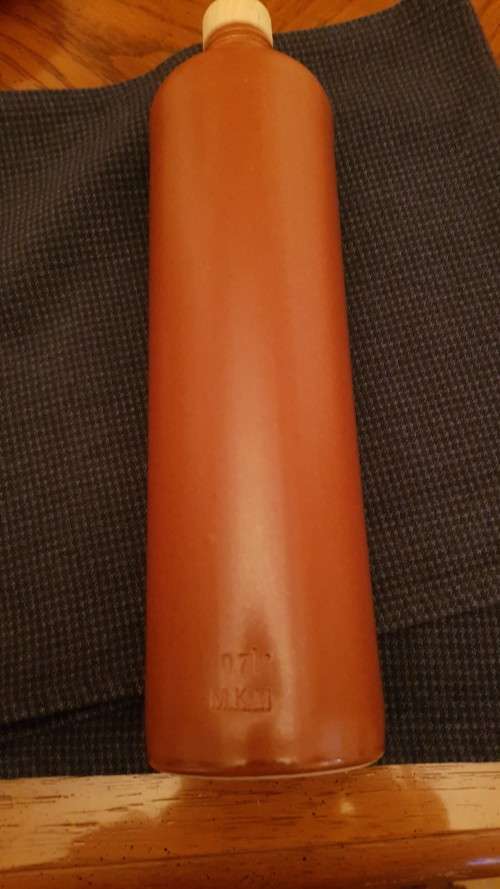 Collectable Stone Bottle (empty) with stopper.  No label, tall bottle - colour brown.