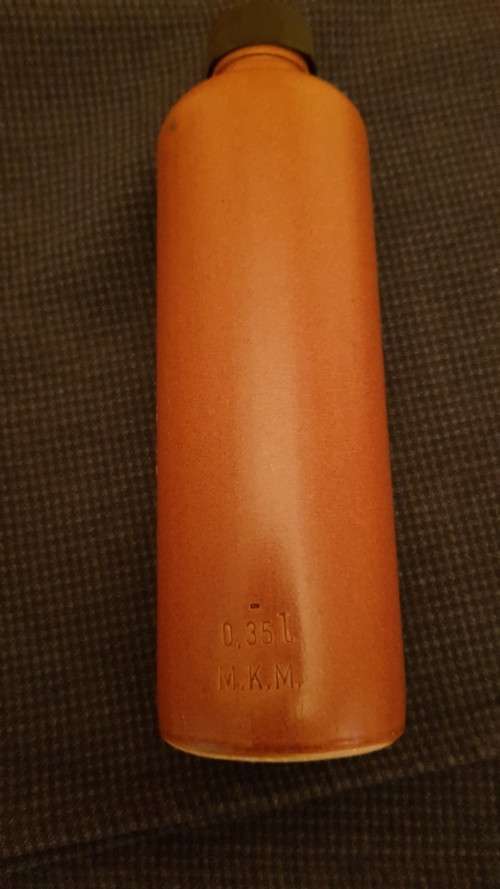 Collectable Stone Bottle (empty) with stopper.  Label  Mierles Pit, Shorter bottle  colour brown.