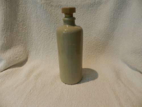 Collectable Stone Bottle (empty) with stopper.  No label. Grey White colour with no label.