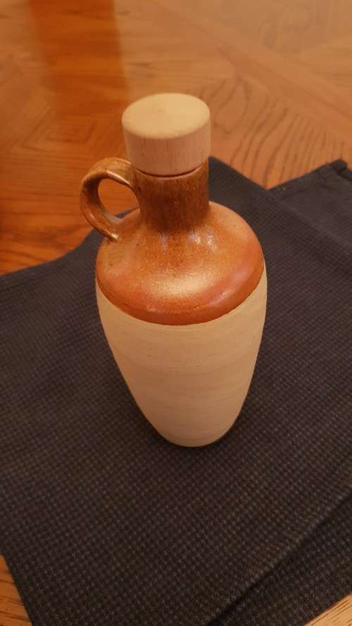 Collectable Stone Bottle (empty) with stopper and round handle.  Mampoer - Willem Prinsloo Agricultu