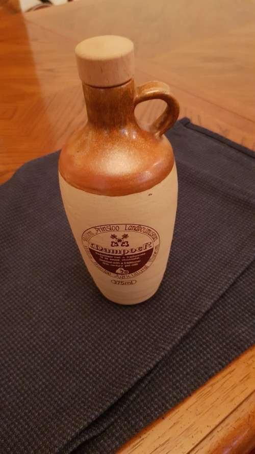 Collectable Stone Bottle (empty) with stopper and round handle.  Mampoer - Willem Prinsloo Agricultu