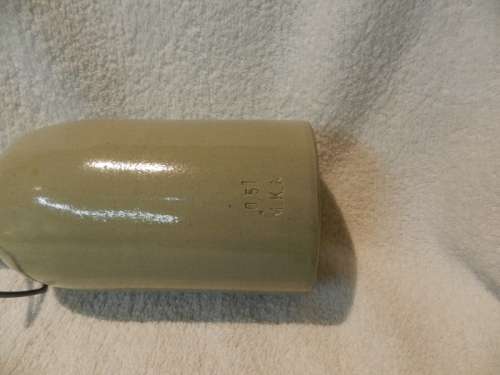 Collectable Stone Bottle (empty) with flip-top stopper and brace.  No label. Colour: Grey/white.