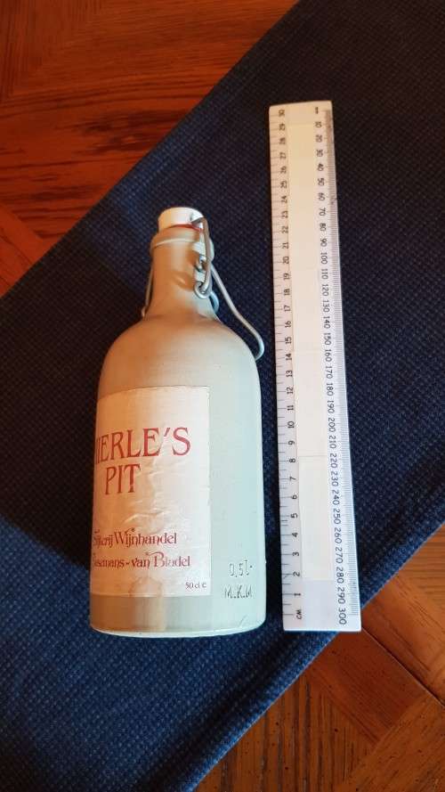 Collectable Stone Bottle (empty) with flip-top stopper and brace.  Label  Mierles Pit.