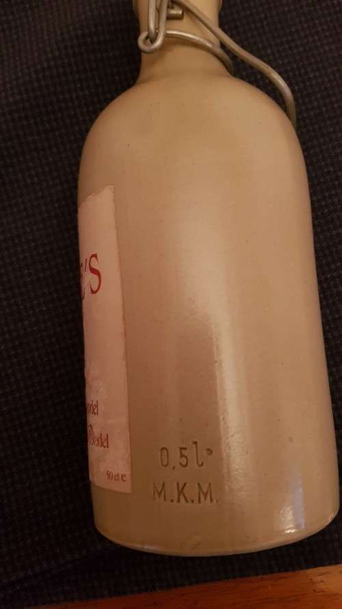 Collectable Stone Bottle (empty) with flip-top stopper and brace.  Label  Mierles Pit.