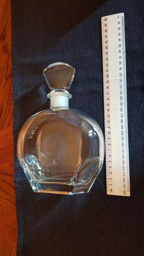 Vintage glass decanter. Thick durable glass with lovely top to stopper.