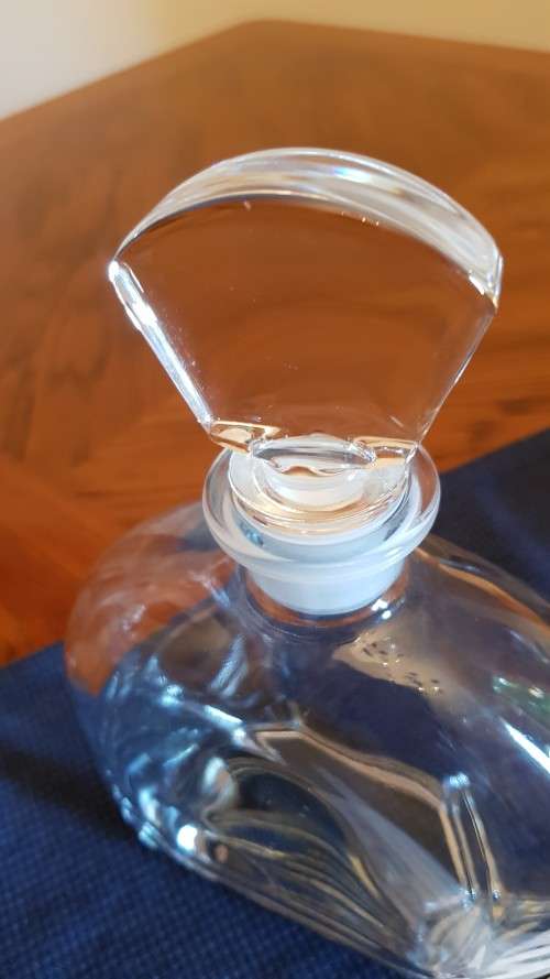 Vintage glass decanter. Thick durable glass with lovely top to stopper.