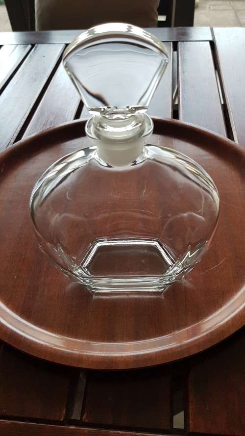 Vintage glass decanter. Thick durable glass with lovely top to stopper.