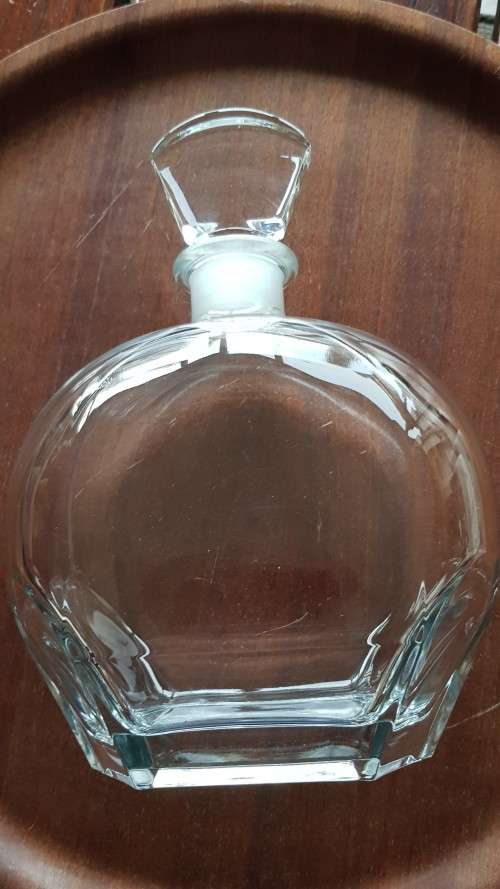 Vintage glass decanter. Thick durable glass with lovely top to stopper.