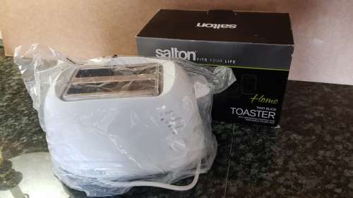 Salton Toaster  Two slice toaster in white plastic.