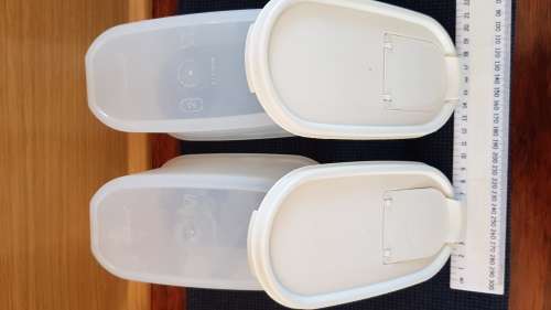 Vintage Tupperware canister storage.  2x Oval canisters (colourless/see through) with secure lid.