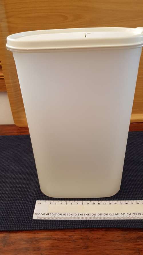 Vintage Tupperware canister storage.  1x Tall Oval canister (colourless/see through) with secure lid