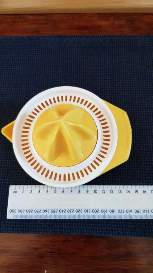 Plastic orange/lemon squeezer.