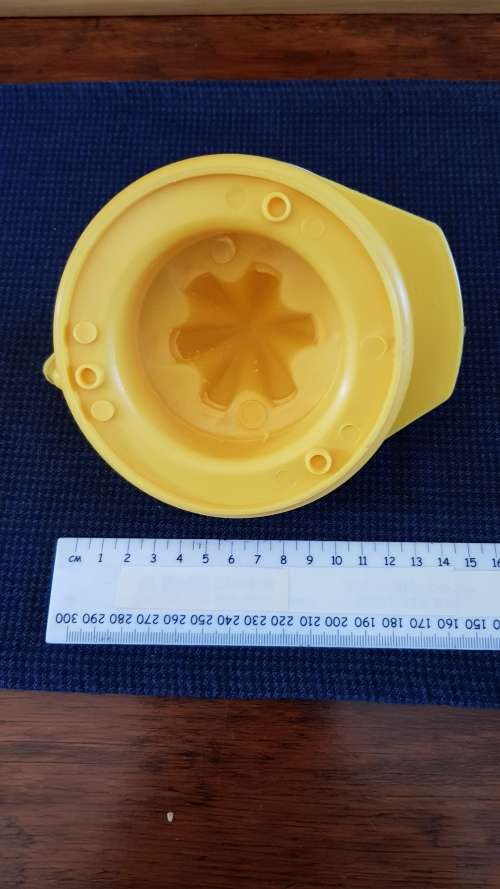 Plastic orange/lemon squeezer.