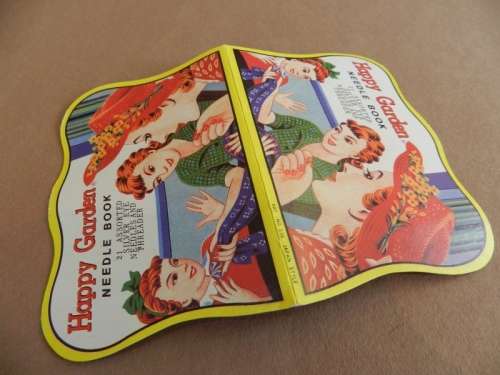 Vintage collectable booklet of 21 assorted silver eye needles and threader.  Happy Garden booklet