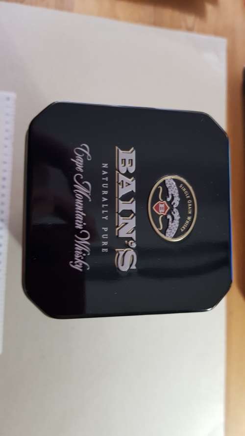 Empty gift Tin.  Bains Whisky Tin container.  Bains Cape Mountain Whisky.