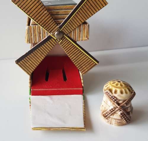 A collectors windmill thimble in original presentation box. Made in England.
