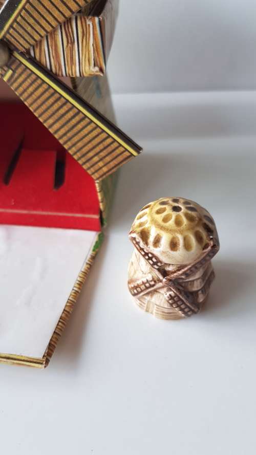 A collectors windmill thimble in original presentation box. Made in England.