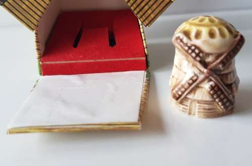 A collectors windmill thimble in original presentation box. Made in England.