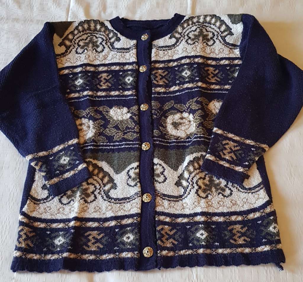 Ladies Blue Cardigan  Blue background with white/beige and green pattern and decorative five button
