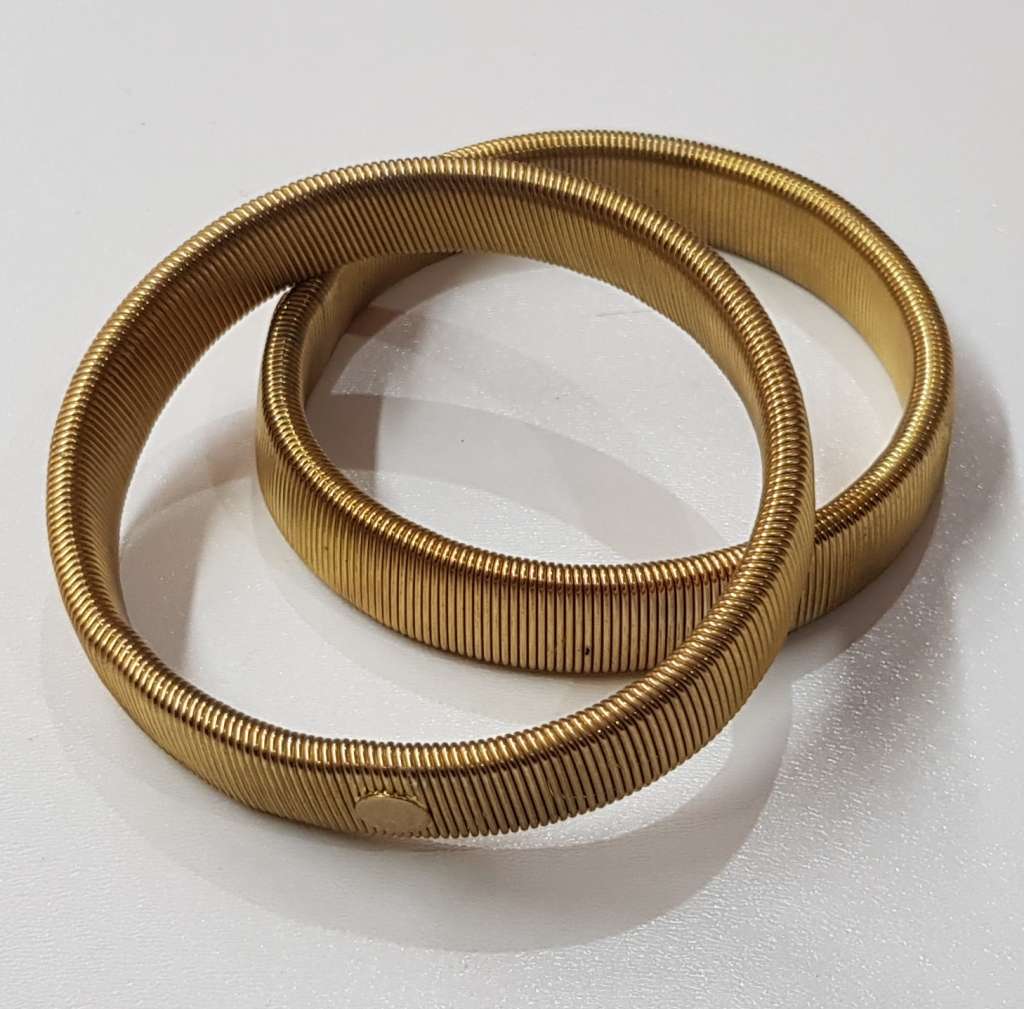 Vintage pair of metal Shirt Sleeve Garters for long sleeves.