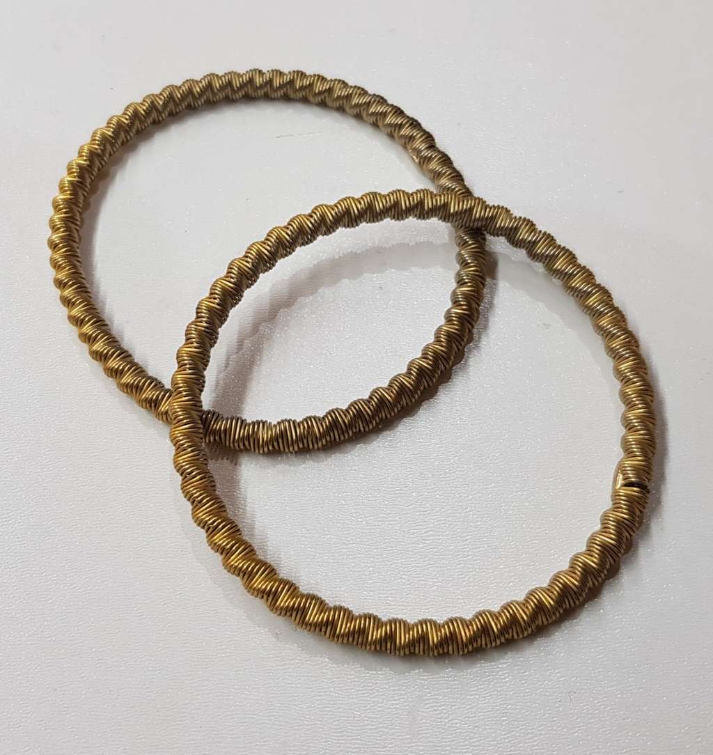 Vintage pair of metal Shirt Sleeve Garters for long sleeves.