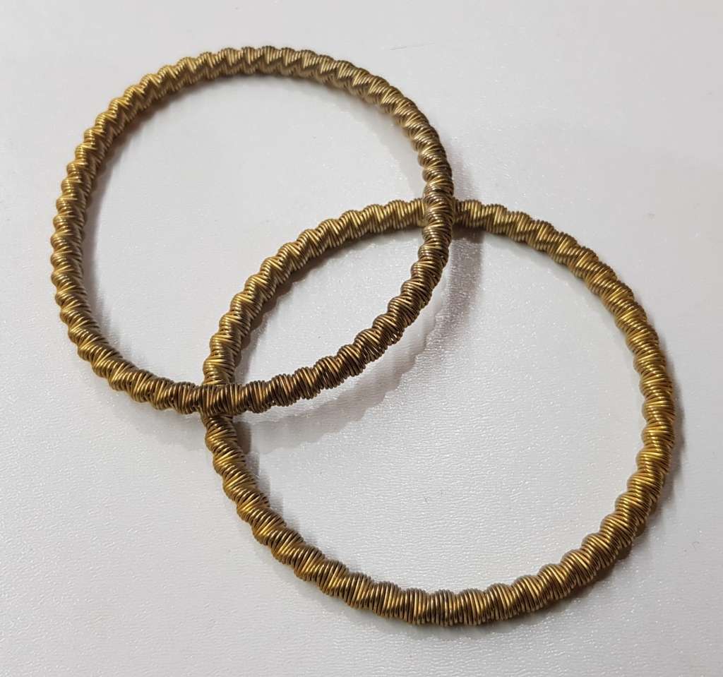 Vintage pair of metal Shirt Sleeve Garters for long sleeves.