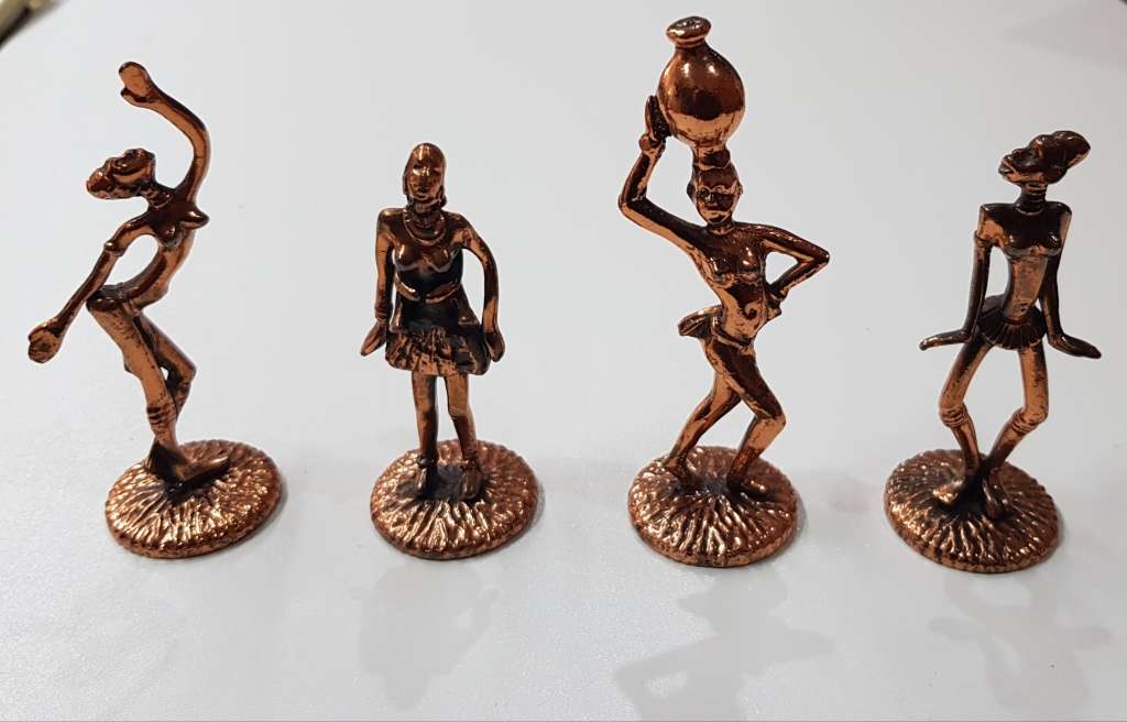 Set of 4x copper coloured metal Ndebele female figures.
