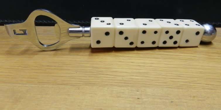 Vintage  Chrome Bar Tool/Game bottle opener with five removable dice on handle.