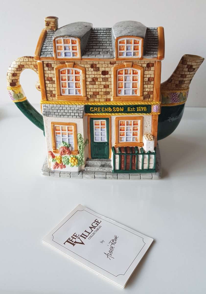 VINTAGE - THE VILLAGE NOVELTY TEAPOT COLLECTION BY ANNIE ROWE.  A Collector`s item.