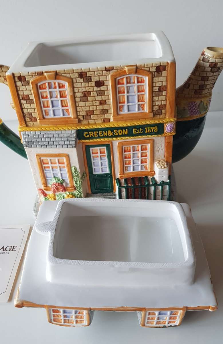 VINTAGE - THE VILLAGE NOVELTY TEAPOT COLLECTION BY ANNIE ROWE.  A Collector`s item.