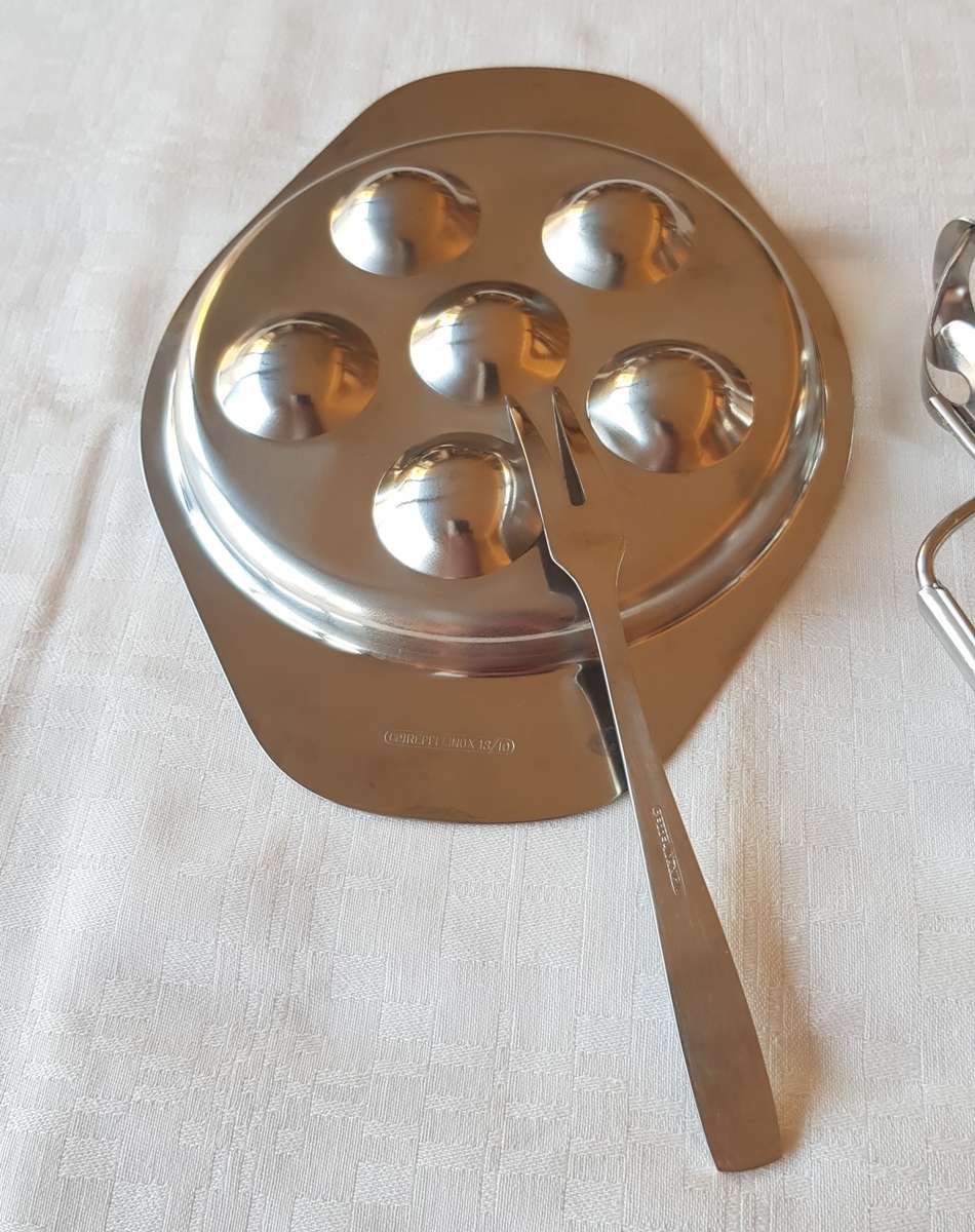 Stainless Steel Escargot dish with tongs and fork.