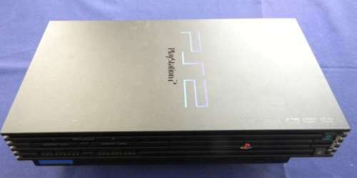 PS2 With lots of extras 3x Controllers Games and Dancing mat