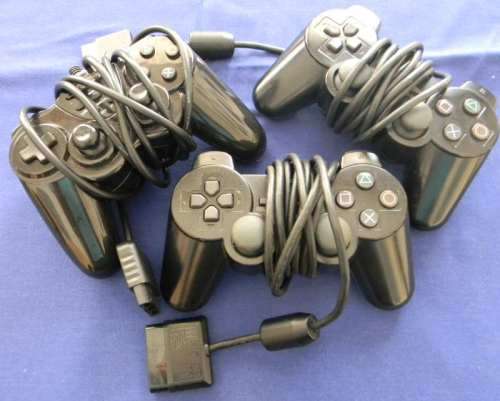 PS2 With lots of extras 3x Controllers Games and Dancing mat